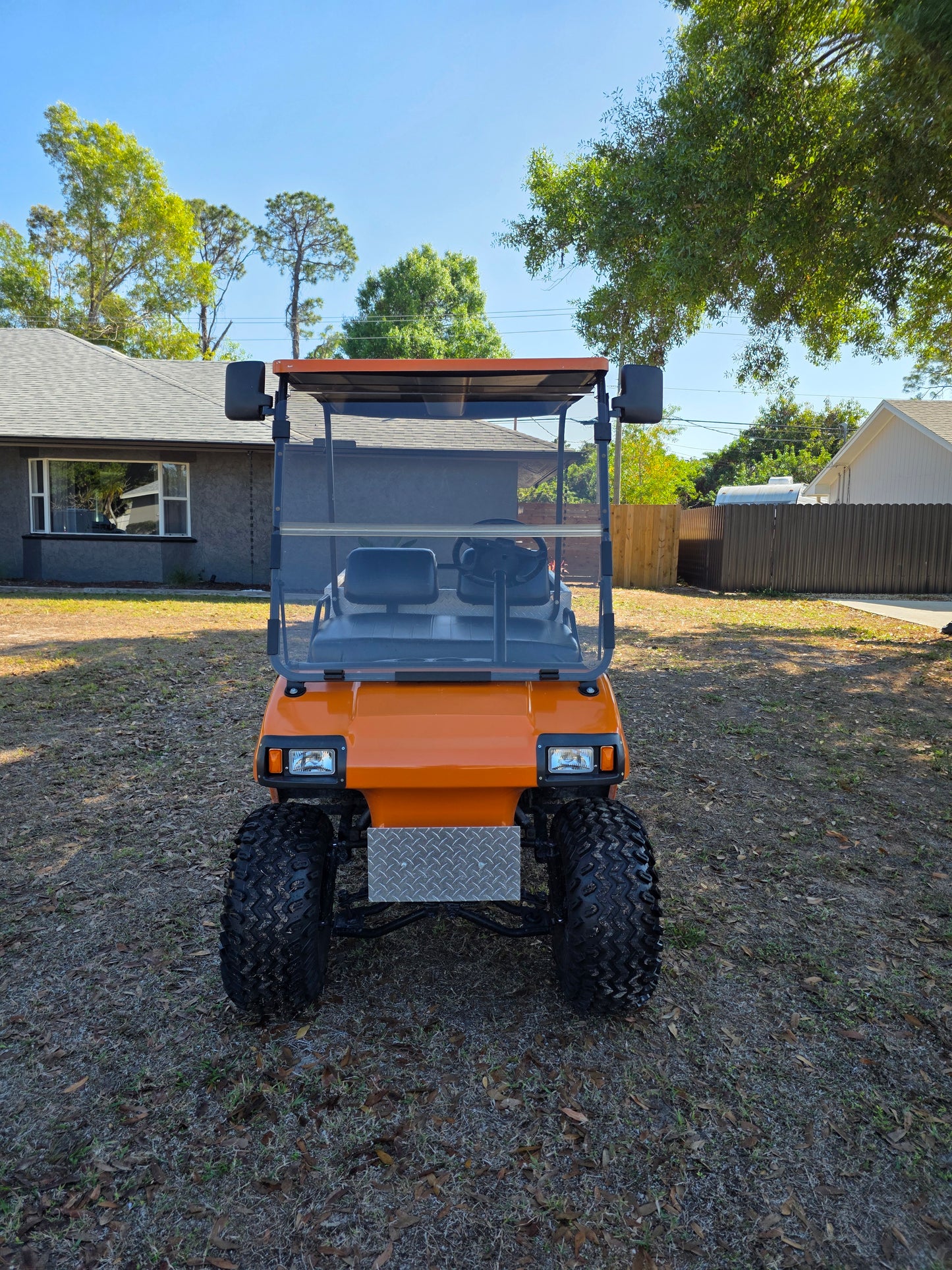 1995 Club Car DS Lifted – 36V | Orange | 23” All-Terrain Tires
